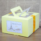 包むケーキのために包む黄色い紙箱ハンドルが付いている Foldable 菓子器