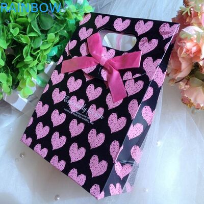 クリスマスのためのハンドルが付いている個人化されたカスタマイズされた紙袋