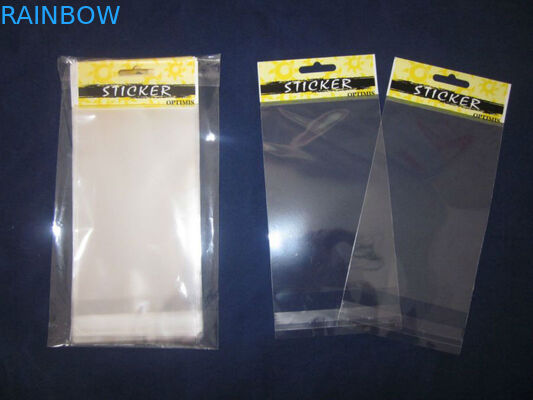 つまようじのための穴が付いている黄色い OPP のヘッド包装の印刷の袋に入れます/OPP チェロ袋