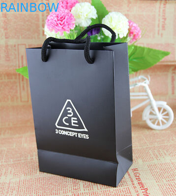 綿のハンドルの茶包装袋が付いているクラフトのカスタム デザインの緑の紙袋