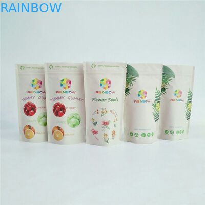 注文の生物分解性PLAクラフト紙のジッパーの袋は茶食品包装の上に立つ