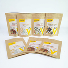 注文の生物分解性PLAクラフト紙のジッパーの袋は茶食品包装の上に立つ