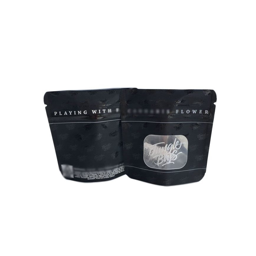 点の紫外線透明で明確な前窓を包む無光沢の黒い表面のプラスチック袋