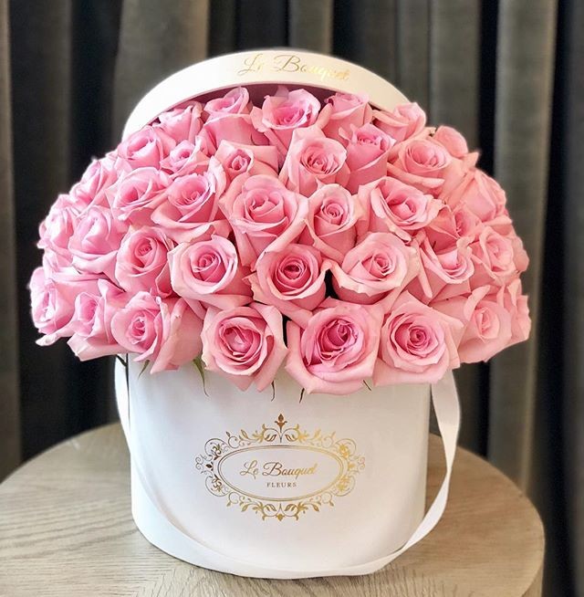 ロゴの防水再生利用できる紙箱の包装のボール紙の円形の花箱