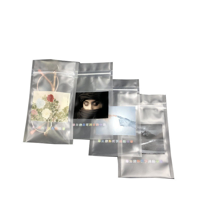 密封される2側面は最下の袋の卸し売り注文の装飾包装袋の再生利用できる明確なポリ袋を折り返す